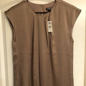 Express size medium short sleeve blouse.